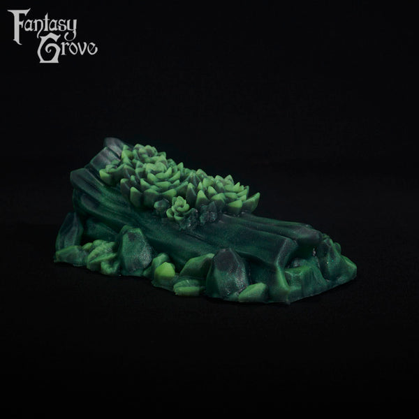A fantasy sex toy on a black background with the Fantasy Grove logo in the upper left corner