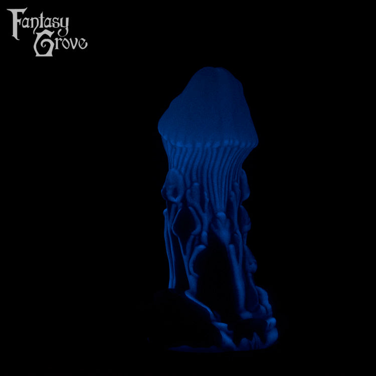 A fantasy sex toy on a black background with the Fantasy Grove logo in the upper left corner