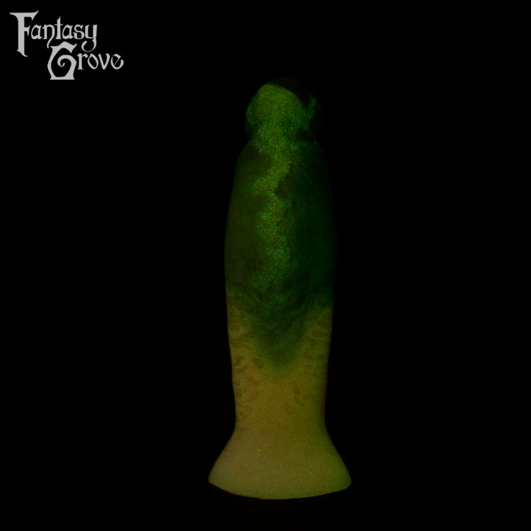 A fantasy sex toy on a black background with the Fantasy Grove logo in the upper left corner 