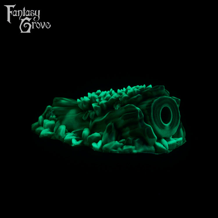 A fantasy sex toy on a black background with the Fantasy Grove logo in the upper left corner