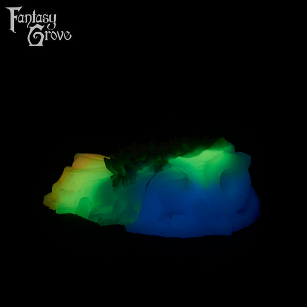 A Fantasy Grove sex toy on a black background with a logo in the upper left corner