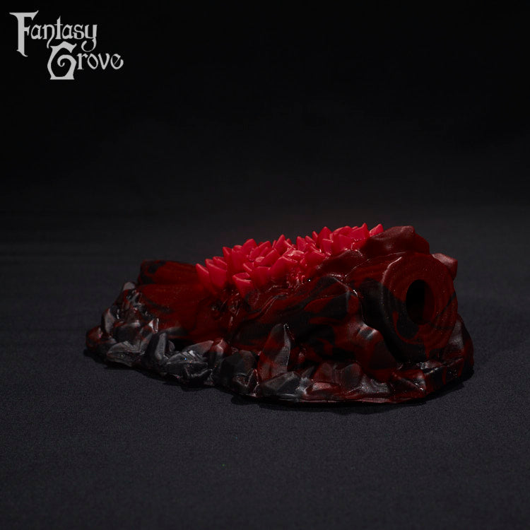 A Fantasy Grove sex toy on a black background with a logo in the upper left corner