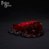 A Fantasy Grove sex toy on a black background with a logo in the upper left corner