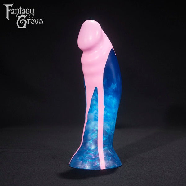 A fantasy sex toy on a black background with the Fantasy Grove logo in the upper left corner 