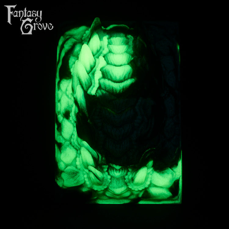 A fantasy sex toy on a black background with the Fantasy Grove logo in the upper left corner