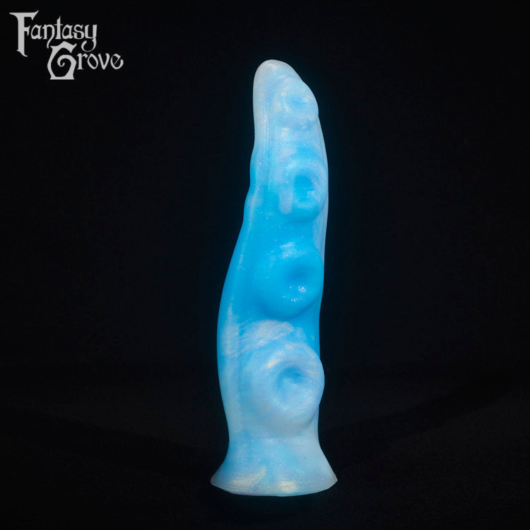 A fantasy sex toy on a black background with the Fantasy Grove logo in the upper left corner