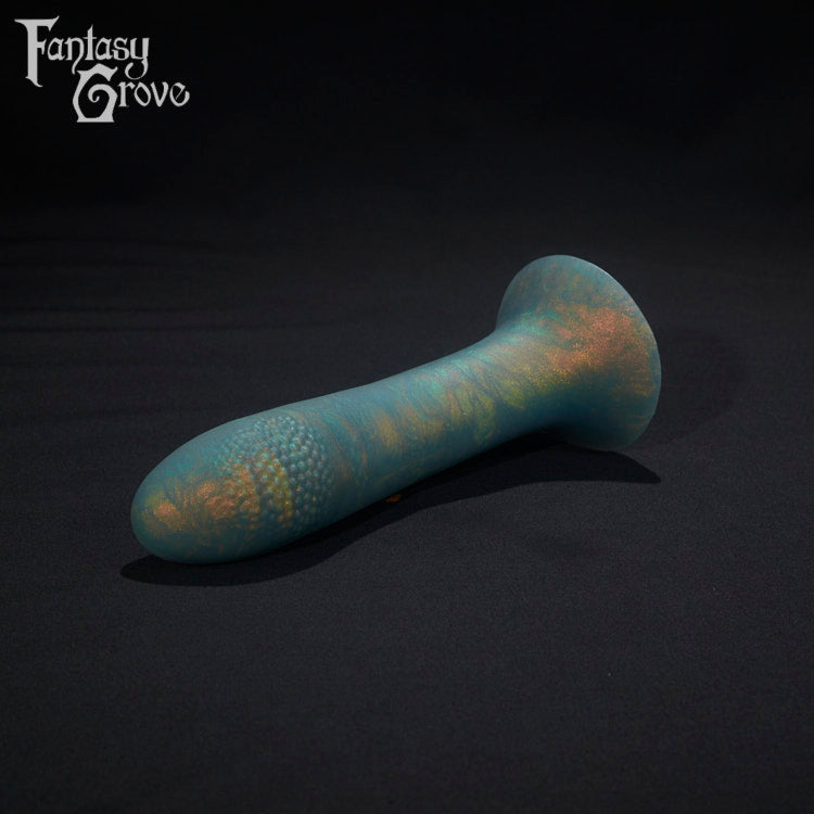 A Fantasy Grove sex toy on a black background with a logo in the upper left corner