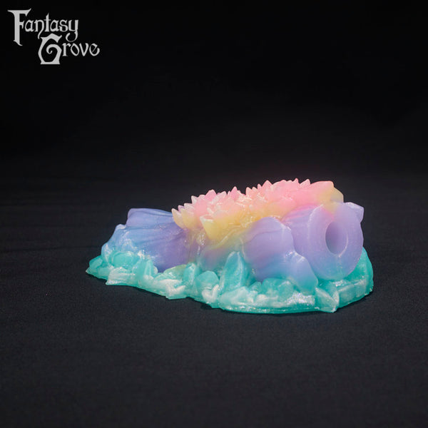 A fantasy sex toys on a black background with Fantasy Grove branding