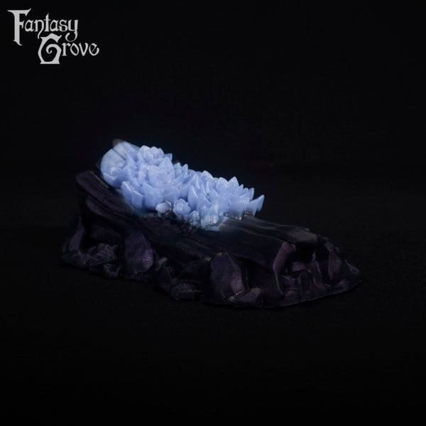 A fantasy sex toy on a black background with the Fantasy Grove logo in the upper left corner