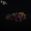 A fantasy sex toy on a black background with the Fantasy Grove logo in the upper left corner