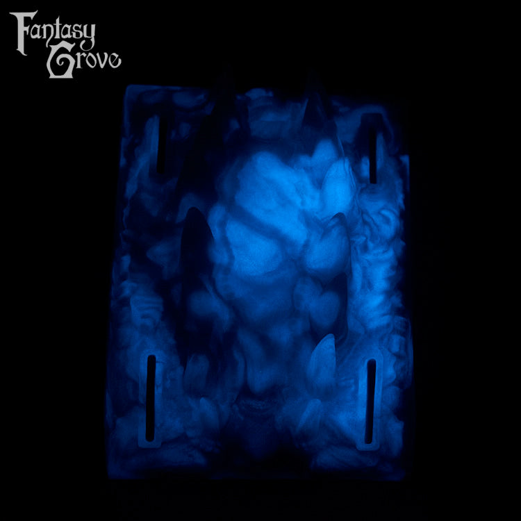 A fantasy sex toy on a black background with the Fantasy Grove logo in the upper left corner