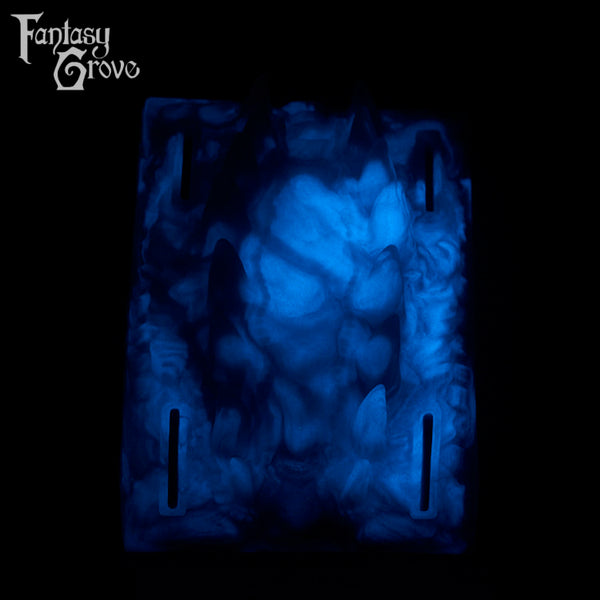 A fantasy sex toy on a black background with the Fantasy Grove logo in the upper left corner