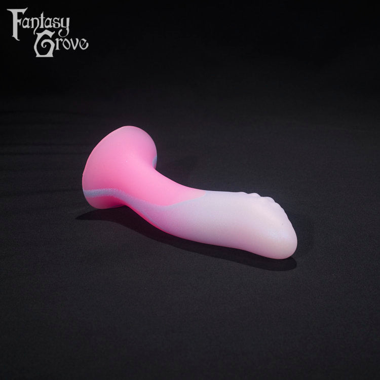 A Fantasy Grove sex toy on a black background with a logo in the upper left corner
