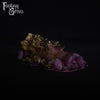 A fantasy sex toy on a black background with the Fantasy Grove logo in the upper left corner