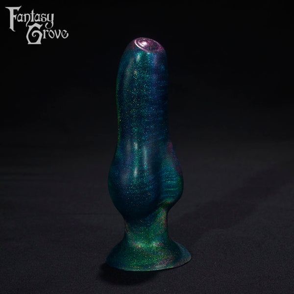 A Fantasy Grove sex toy on a black background with a logo in the upper left corner