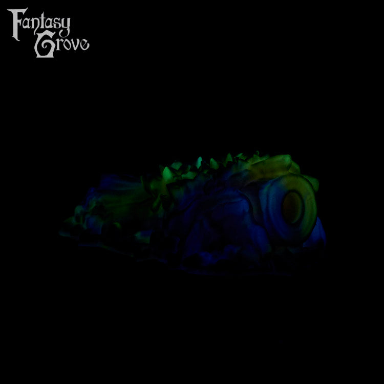 A fantasy sex toy on a black background with the Fantasy Grove logo in the upper left corner