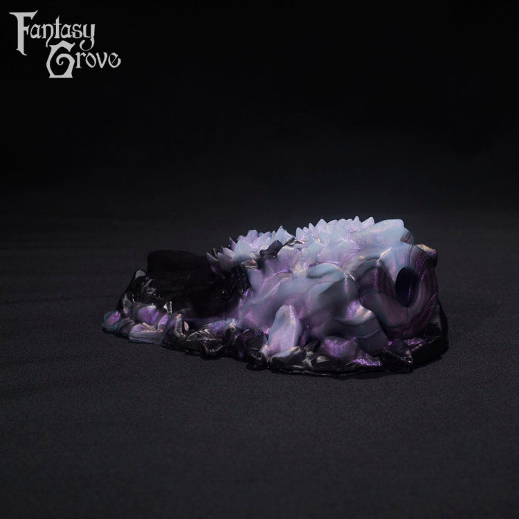 A fantasy sex toys on a black background with Fantasy Grove branding