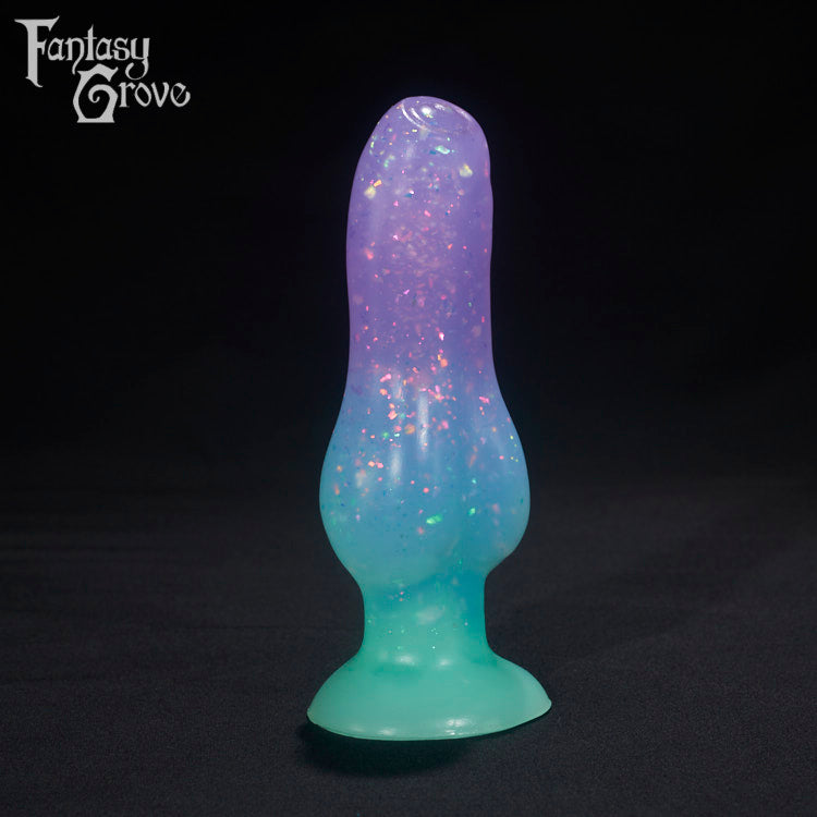 A Fantasy Grove sex toy on a black background with a logo in the upper left corner