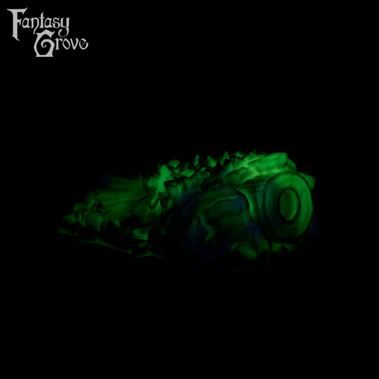 A fantasy sex toy on a black background with the Fantasy Grove logo in the upper left corner