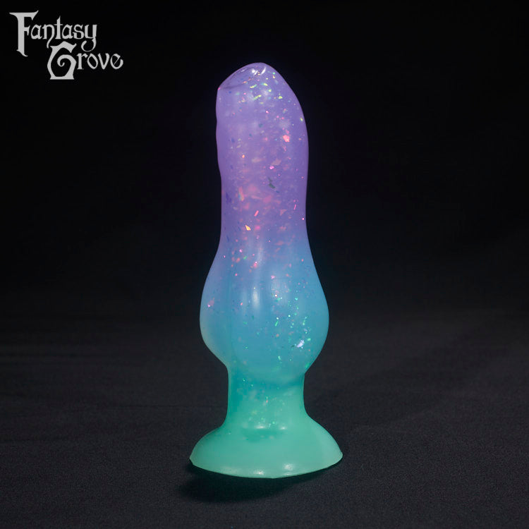 A Fantasy Grove sex toy on a black background with a logo in the upper left corner