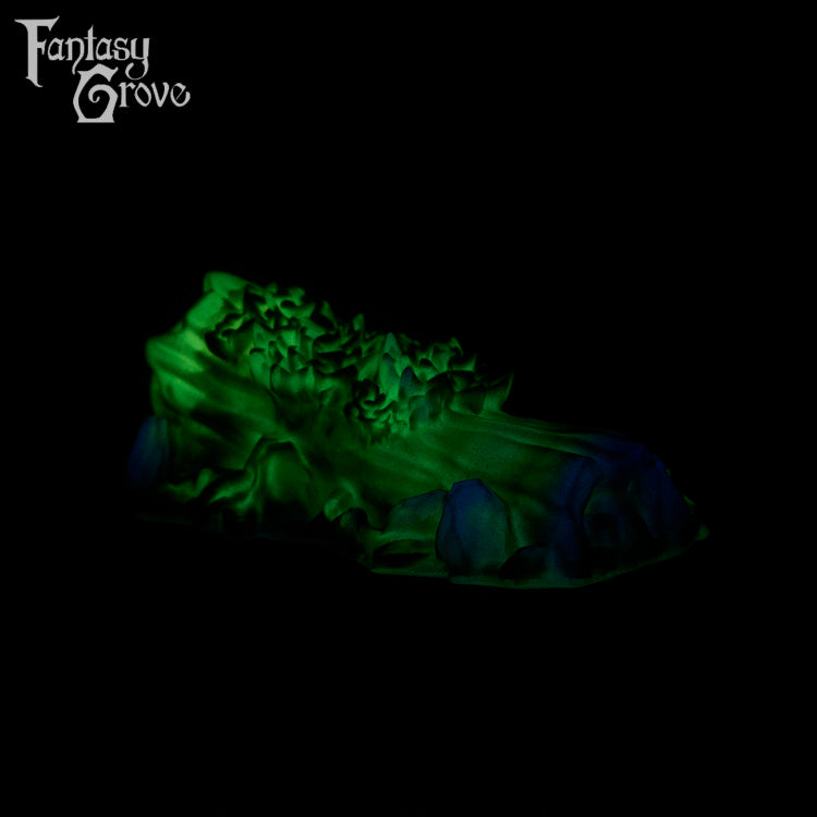 A fantasy sex toy on a black background with the Fantasy Grove logo in the upper left corner