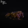 A fantasy sex toy on a black background with the Fantasy Grove logo in the upper left corner
