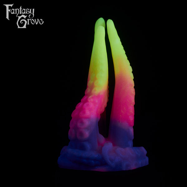 A fantasy sex toy on a black background with the Fantasy Grove logo in the upper left corner