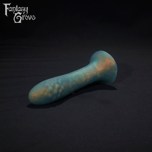A Fantasy Grove sex toy on a black background with a logo in the upper left corner