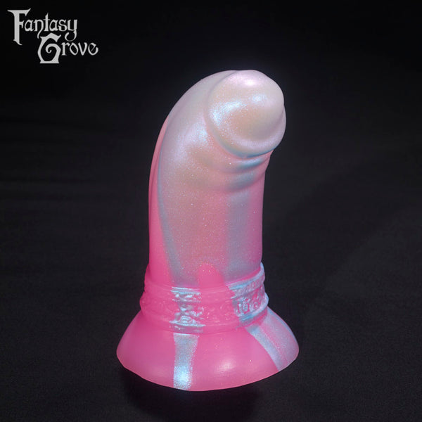 A Fantasy Grove sex toy on a black background with a logo in the upper left corner