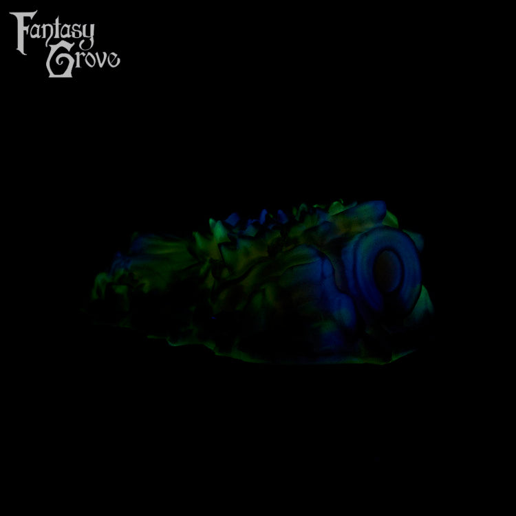 A fantasy sex toy on a black background with the Fantasy Grove logo in the upper left corner