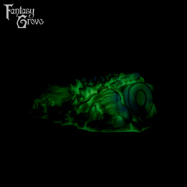 A fantasy sex toy on a black background with the Fantasy Grove logo in the upper left corner