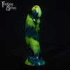 A fantasy sex toy on a black background with the Fantasy Grove logo in the upper left corner