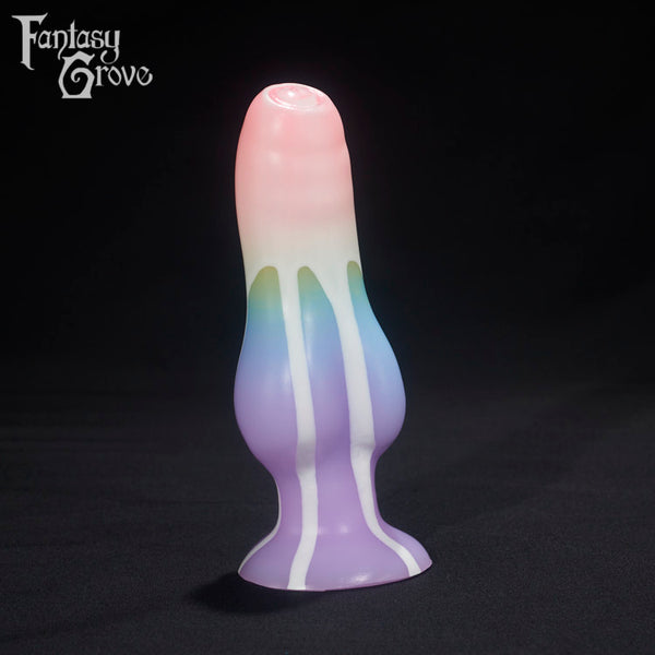 A Fantasy Grove sex toy on a black background with a logo in the upper left corner