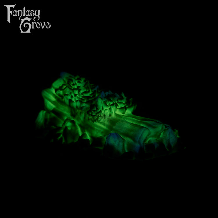 A fantasy sex toy on a black background with the Fantasy Grove logo in the upper left corner