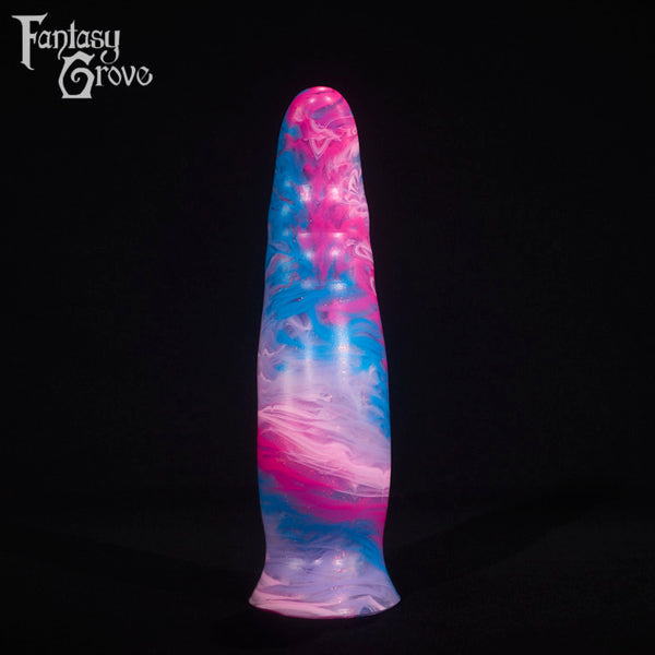 A fantasy sex toy on a black background with the Fantasy Grove logo in the upper left corner