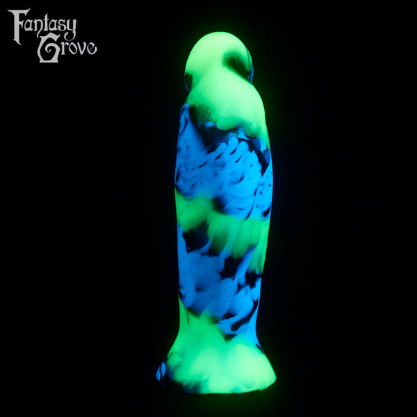 A fantasy sex toy on a black background with the Fantasy Grove logo in the upper left corner