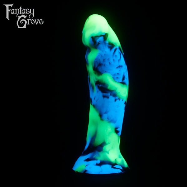 A fantasy sex toy on a black background with the Fantasy Grove logo in the upper left corner