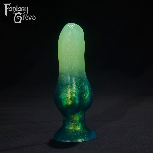 A fantasy sex toys on a black background with Fantasy Grove branding