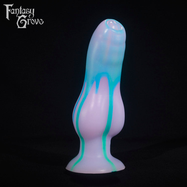 A fantasy sex toy on a black background with the Fantasy Grove logo in the upper left corner