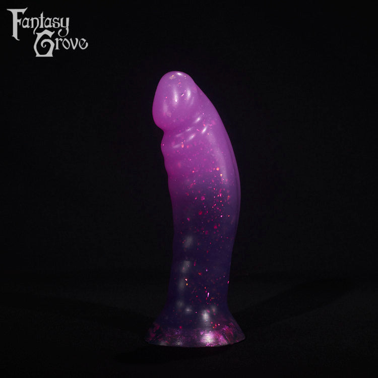 A fantasy sex toy on a black background with the Fantasy Grove logo in the upper left corner