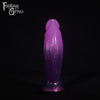 A fantasy sex toy on a black background with the Fantasy Grove logo in the upper left corner