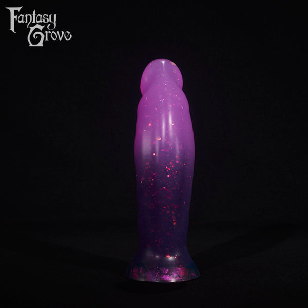 A fantasy sex toy on a black background with the Fantasy Grove logo in the upper left corner
