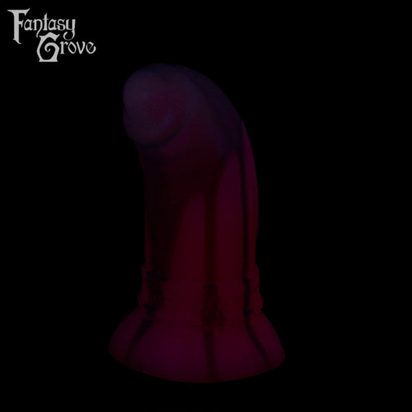 A Fantasy Grove sex toy on a black background with a logo in the upper left corner