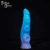 A fantasy sex toy on a black background with the Fantasy Grove logo in the upper left corner