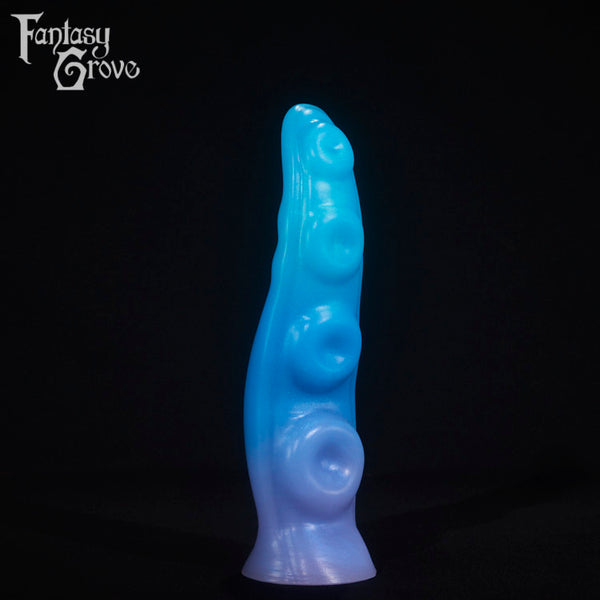 A fantasy sex toy on a black background with the Fantasy Grove logo in the upper left corner