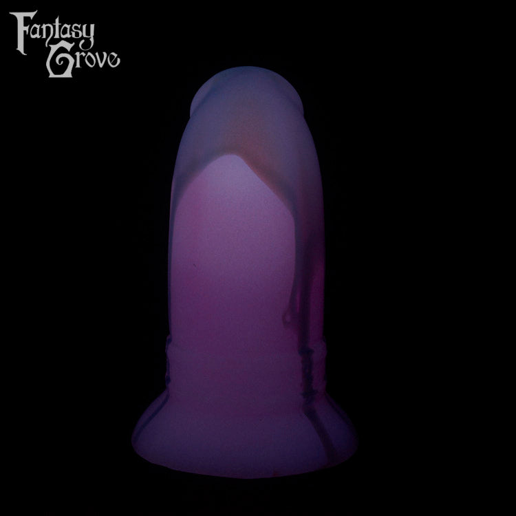 A Fantasy Grove sex toy on a black background with a logo in the upper left corner