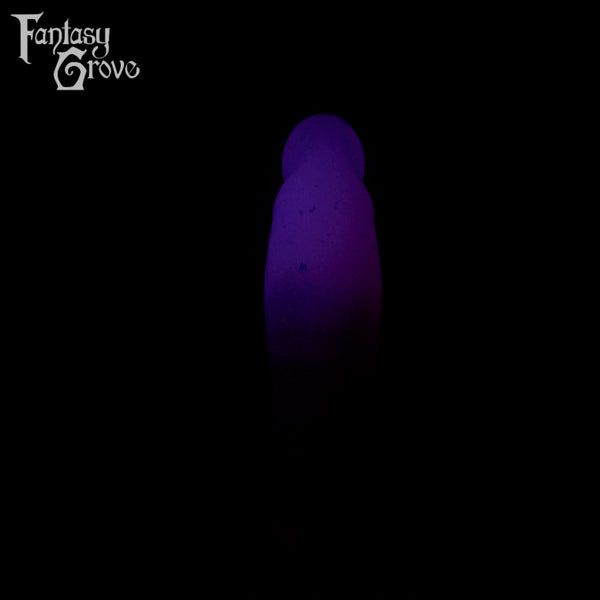 A fantasy sex toy on a black background with the Fantasy Grove logo in the upper left corner