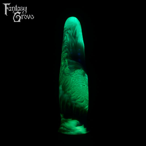 A fantasy sex toy on a black background with the Fantasy Grove logo in the upper left corner