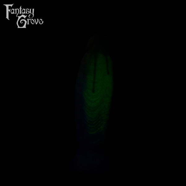 A fantasy sex toy on a black background with the Fantasy Grove logo in the upper left corner 