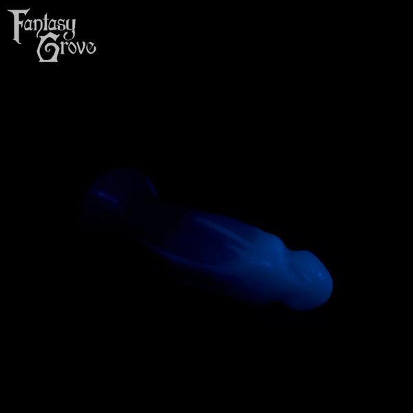 A fantasy sex toy on a black background with the Fantasy Grove logo in the upper left corner